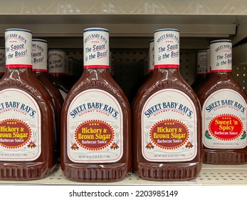 Houston, Texas, USA - February 22, 2022: Sweet Baby Ray's Hickory And Brown Sugar Barbecue Sauce 40 Oz Bottles For Sale On The Shelf In A Store.  