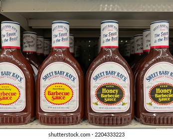 
Houston, Texas, USA - February 22, 2022: Sweet Baby Ray's Original And Honey Barbecue Sauce 40 Oz. Bottles On The Shelf In A Supermarket. 
