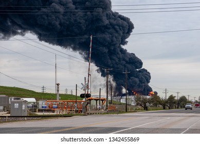 HOUSTON, TEXAS, USA - MARCH 18, 2019: Flames Coming From Burning Tanks After Fire Accident At Petrochemical Plant Intercontinental Terminals Company Near Deer Park