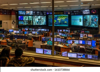 Houston, Texas / USA - September 9, 2019: People Watching The Flight Control Teams In The Mission Control Room At NASA, Who Monitor The Astronauts At The International Space Station ISS