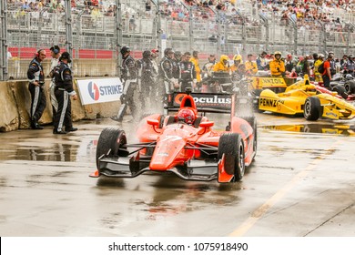 Houston, Texas/United States - June 28, 2014: Indy Car Racing On The Street Circuit At The Houston Grand Prix. A Indy Car Leaves Pit Lane.