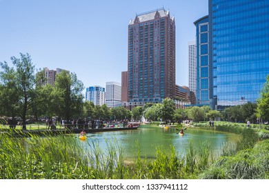 Houston, TX - April 15, 2018: People Learn Kayaking Skills On Kinder Lake In Discovery Green Park Houston Texas.