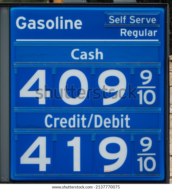 Houston, TX, US - March 21,\
2022: Gas Station sign detail of price per gallon in Houston\
Texas.