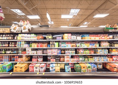 HOUSTON, TX, USA - JUL 3, 2017:Wide Selection Of Domestic And Imported Beer At Grocery Store Open Fridge. Various Bottles Of Craft, Microbrews, IPAs, From Around The World On Shelf Display