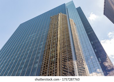 Houston TX/USA-June 2020: Bank Of America Tower Reflecting JP Morgan Chase Tower In Its Mirror Facade