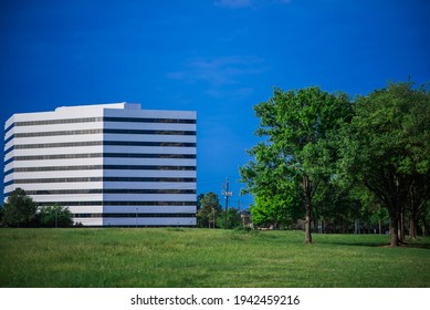 HOUSTON, UNITED STATES - Apr 05, 2015: Bussiness Building With Good Green Field On It's Around For Recreation On A Beutifull Day