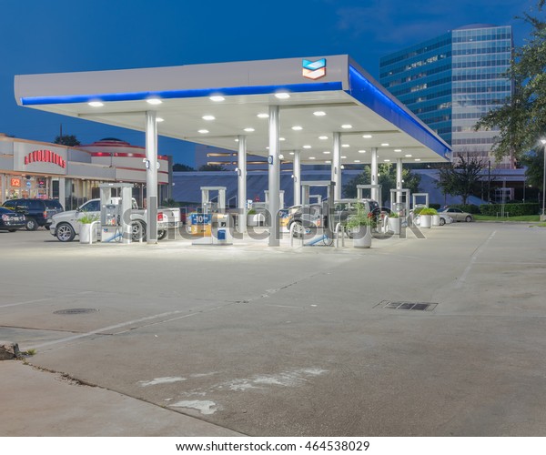 HOUSTON, US-JUN 30, 2016:Chevron gas station and\
convenience store at blue hour. It is an American multinational\
energy corporation. The successor of Standard Oil with\
headquartered in San Ramon,\
CA