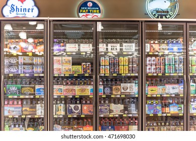 HOUSTON,US-AUG 21,2016:Various Bottles Of Craft, Microbrew, IPA, Domestic And Imported Beers From Around The World On Shelf Display In Supermarket Cooler.Alcohol Drink Background, Different Beer Style