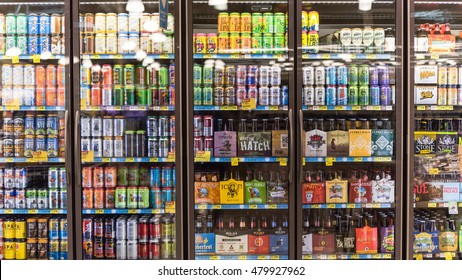 HOUSTON,US-AUG 21,2016:Various Bottles Of Craft, Microbrew, IPA, Domestic And Imported Beers From Around The World On Shelf Display In Supermarket Cooler.Alcohol Drink Background, Different Beer Style