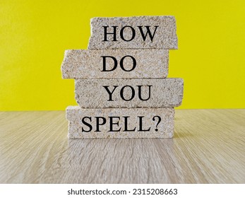 HOW DO YOU SPELL inscription on brick blocks, yellow background. Idea for Spelling bee, Quiz, Header for presentation, miswritten or mispronouced words. - Shutterstock ID 2315208663