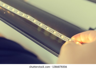 How to install led strip for lighting correctly on the surface of the TV - Shutterstock ID 1386878306