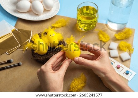 How to make a chick from eggs for Easter decor. Handmade decoration Easter egg chick. Step by step instructions. Childrens DIY concept. The handicraft is ready.