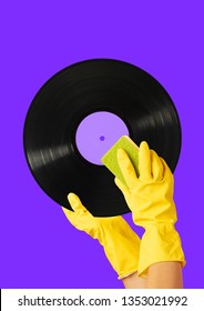 How To Make A Clean Sound. Hands In Yellow Housewifely Glove With The Sponge Cleaning Black Vinyl Record Against Purple Background. Music Concept. Modern Design. Contemporary Art Collage.