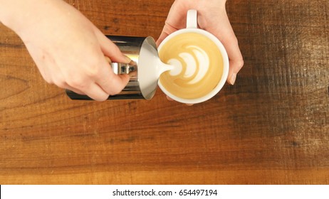 How to make latte art by barista focus in milk and coffee
