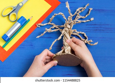 How To Make Together With Child Autumn Tree From Craft Package. Original Children's Art Project. DIY Concept. Step-by-step Photo Instructions. Step 6. Stick Cardboard To Base Of Tree