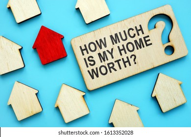 How Much Is My Home Worth Sign And Red House Model.