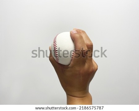How a pitcher catches a baseball when throwing a ball
