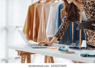 How To Start A Clothing Store Online Business apparel! Young confident asian female fashion owner social media influencer Live selling clothes, new products at home office small business e-commerce. - Powered by Shutterstock