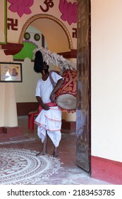 Howrah, India -October 26th, 2020 : Dhaaki Playing Dhaak Decorated With Kaash Ful, Inside Old Age Decorated Home. Durga Puja, Biggest Festival Of Hinduism, UNESCO Cultural Heritage Of Humanity.