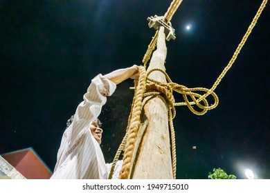 Howrah, West Bengal, India - 15th April 2019 : Holy Wood Being Erected During Gajan And Charak Puja - A Hindu Festival. Lord Shiva, Neel And Dharmathakur Are Worshipped By Worshipping This Wood.