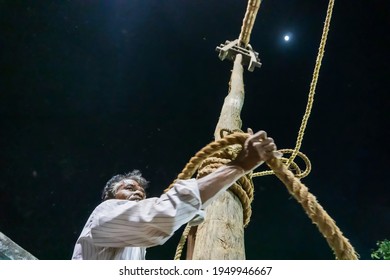 Howrah, West Bengal, India - 15th April 2019 : Holy Wood Being Erected During Gajan And Charak Puja - A Hindu Festival. Lord Shiva, Neel And Dharmathakur Are Worshipped By Worshipping This Wood.