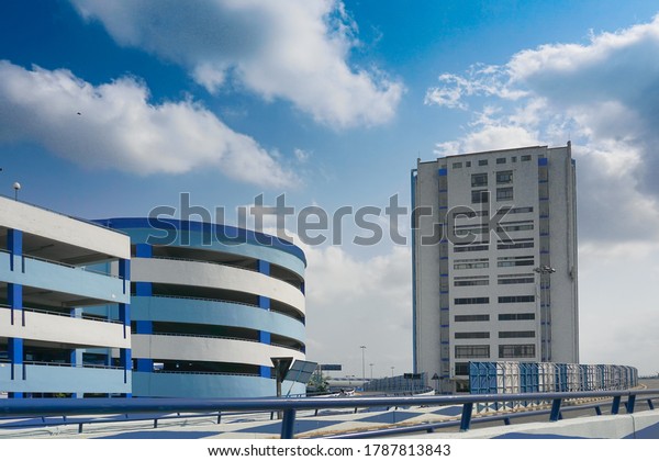 Howrah, West Bengal, India - May 23rd 2020 :\
Car parking lot and Nabanna, building in Howrah, houses the State\
Secretariat of West Bengal. Office of the respected Chief Minister,\
Smt. Mamata Banerjee.