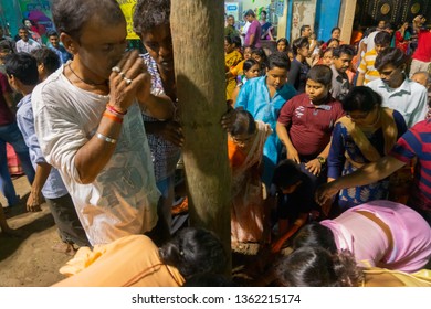 HOWRAH,WEST BENGAL, INDIA - APRIL 15TH, 2018 : Devotees Praying To Wood - During Gajan And Charak Puja-a Hindu Festival. Lord Shiva, Neel And Dharmathakur Are Worshipped. Ends Before Bengali New Year.