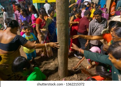 HOWRAH,WEST BENGAL, INDIA - APRIL 15TH, 2018 : Devotees Praying To Wood - During Gajan And Charak Puja-a Hindu Festival. Lord Shiva, Neel And Dharmathakur Are Worshipped. Ends Before Bengali New Year.