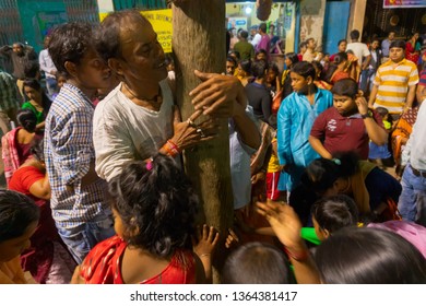 HOWRAH,WEST BENGAL, INDIA - APRIL 15TH, 2018 : Devotees Praying To Wood - During Gajan And Charak Puja-a Hindu Festival. Lord Shiva, Neel And Dharmathakur Are Worshipped. Ends Before Bengali New Year.