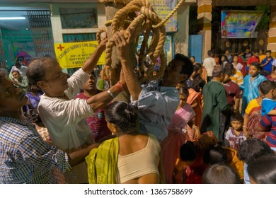 HOWRAH,WEST BENGAL, INDIA - APRIL 15TH, 2018 : Devotees Praying To Wood - During Gajan And Charak Puja-a Hindu Festival. Lord Shiva, Neel And Dharmathakur Are Worshipped. Ends Before Bengali New Year.