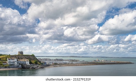 Howth marina and Martello Tower seen from Howth cliff walk, popular tourist attraction, Dublin, Ireland