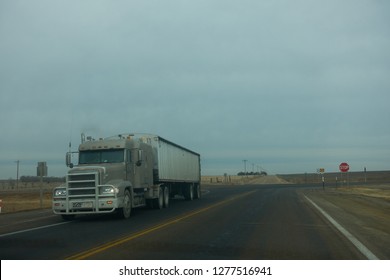 Hoxie, Kansas, USA - 12/2018:  Passing semi truck on highway                                
