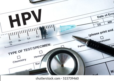 HPV CONCEPT    Virus vaccine with syringe  HPV criteria for pap smear slide cytology.