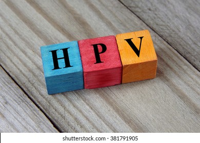 HPV (Human Papillomavirus) acronym on colorful wooden cubes