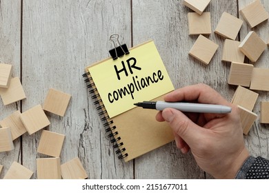 HR Compliance Text On Yellow Sticker Male Hand Writing Text