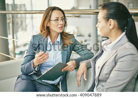 Hr manager asking questions to female candidate