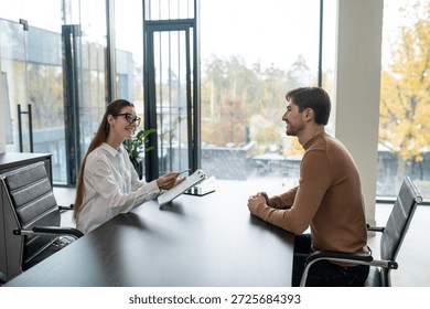 HR manager having an interview with a candidate and both looking involved