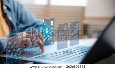 HR manager using digital interface to review candidate resumes, representing online recruitment, talent acquisition, job applications, employee selection, and modern human resource technology.