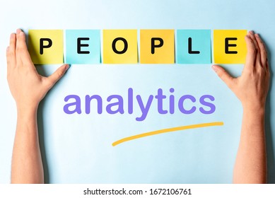 HR People Analytics Concept. Hands Showing Multi Colored Notes With The Words People And Analytics.