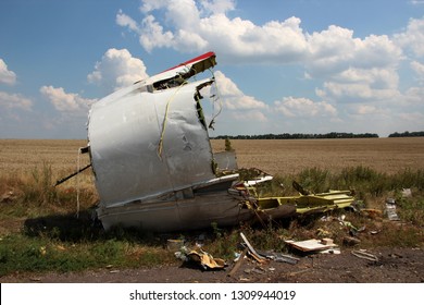 Hrabovo, Donetsk region / Ukraine - 07.23.2014   Crash site on July 17, 2014 of the Boeing-777 of Malaysia airlines, flight MH17 near Hrabovo village. Plane fragments in the field. 