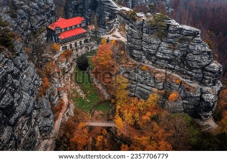 Hrensko, Czech Republic - Aerial panoramic view of the famous Falcon's Nest at Pravcicka Brana (Pravcicka Gate) in Bohemian Switzerland National Park, the biggest natural arch in Europe at autumn