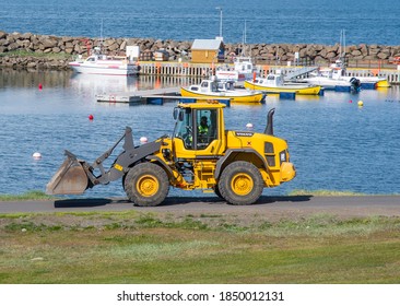 Hrisey Iceland - June 19. 2020: Volvo Wheel Loader On The Street