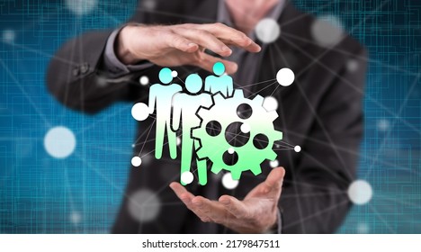 Hrm concept between hands of a man in background - Shutterstock ID 2179847511