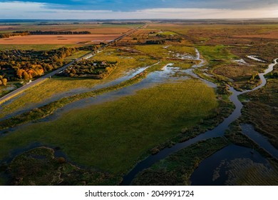 Hrodna Region, Belarus-September 2021: A Beautiful Autumn Landscape At Sunset With A Flood Of The River After The Rains In The Bird Sanctuary, Where Birds Spend The Night During Their Migration.