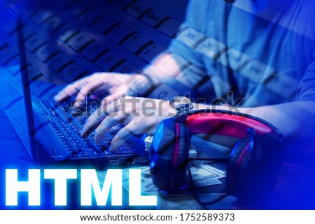 HTML development. Man writes the code. Hands of a man on a laptop keyboard. Concept - HTML programmer vacancy. HTML inscription next to developer. Work for programmers. Employment web developer.