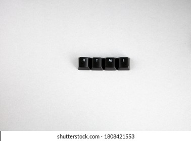 HTML spelled using black keys from  computer keypad, web programming language, hypertext markup language white background