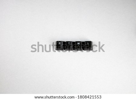 HTML spelled using black keys from  computer keypad, web programming language, hypertext markup language white background