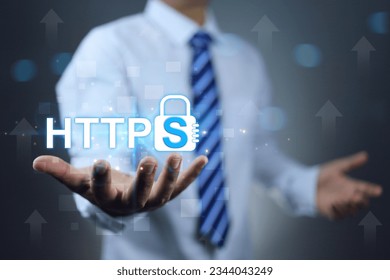 https secured internet concept. Businessman or programmer holding address security website on hand represent more security  domain and https text on log symbol.