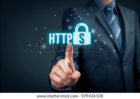 HTTPS - secured internet concept. Businessman or programmer click on https text and padlock symbol.
