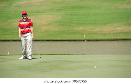 HUA HIN, THAILAND - JANUARY 9: Kim Kyung-tae of Korea reacts after a putt on the 8th hole on day 3 of The Royal Trophy tournament on January 9, 2011 at Black Mountain Golf Club in Hua Hin, Thailand